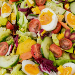 a Butter Lettuce Salad with eggs