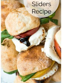 a caprese sandwich slider with drizzled balsamic glaze