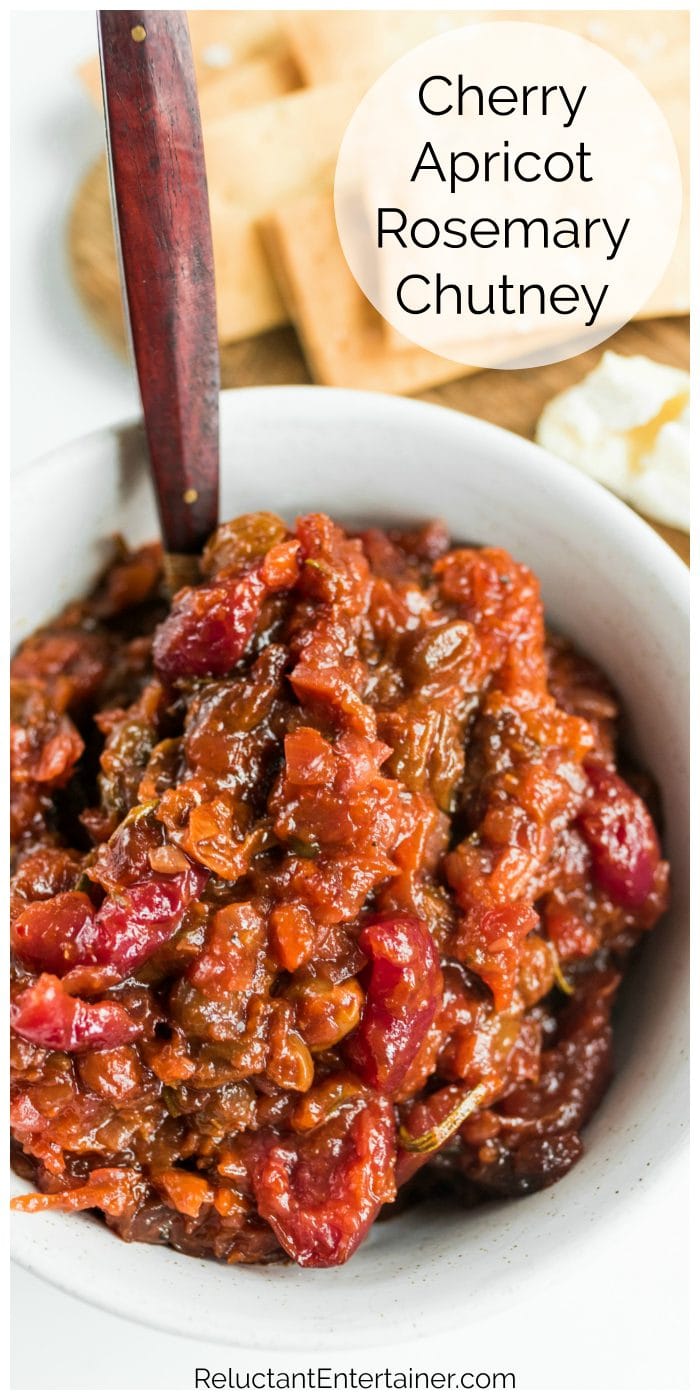 close up white bowl of apricot and cherry chutney