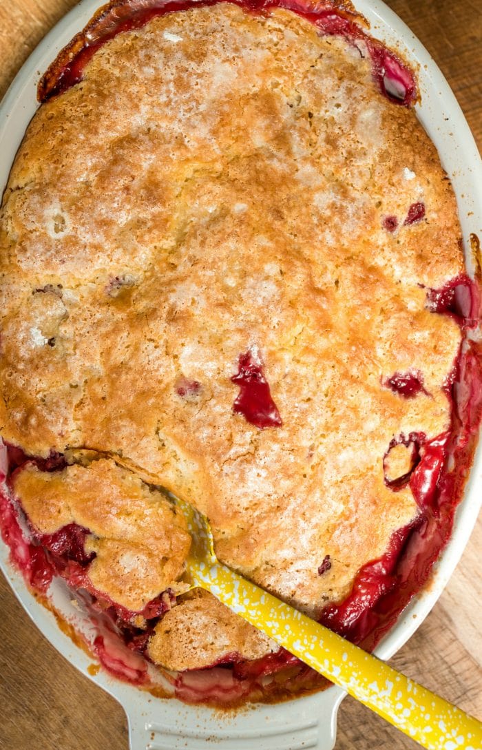 a summer cobbler with red fruit