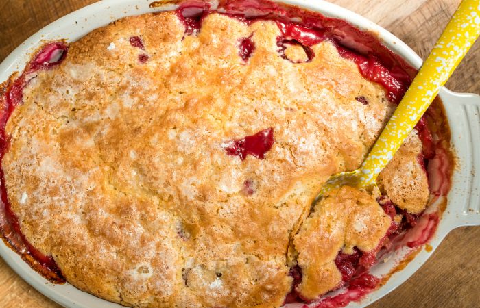 a spoonful of summer berry cobbler