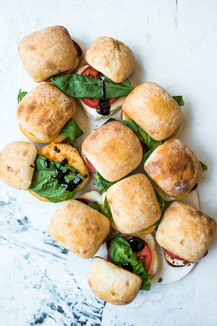 a platter of caprese sliders