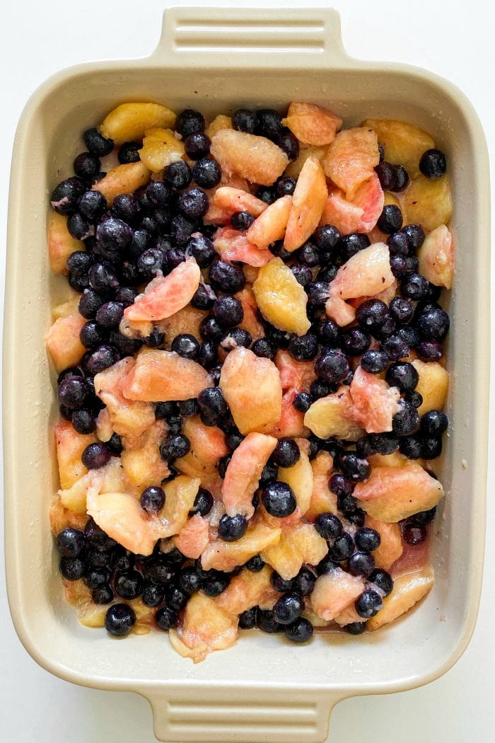 fresh blueberries and peaches in a 9 x 13 pan (without cobbler topping)