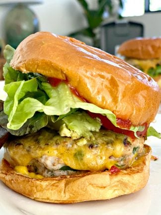 a Savory Turkey Burger with cheese, lettuce, ketchup