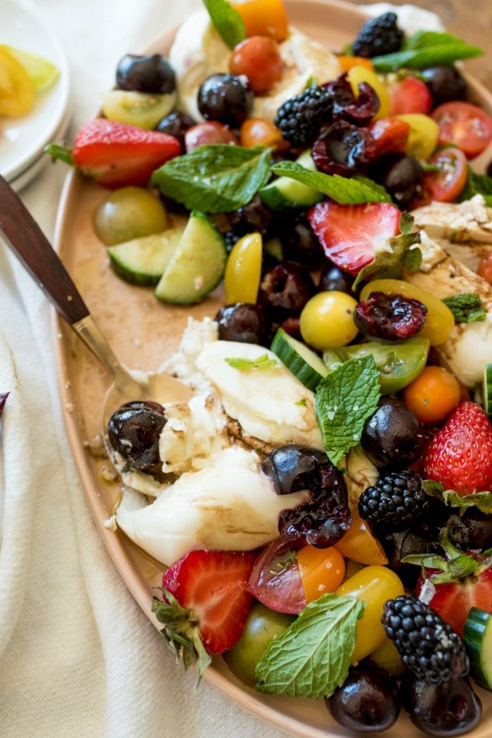 burrata and berry salad with fresh mint and cherry tomatoes