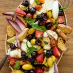 oval platter of Easy Burrata Berry Salad