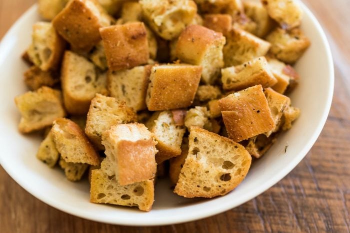 white bowl of Italian Croutons 