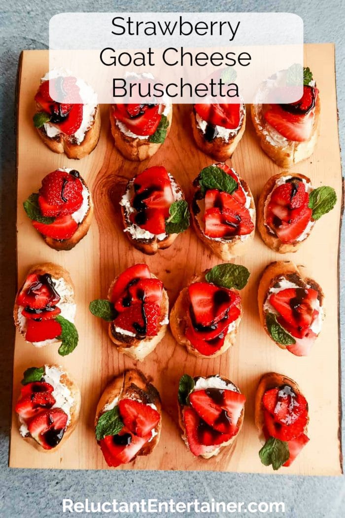 wood board of 12 strawberry bruschetta bites
