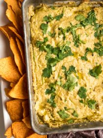 pan of Corn Queso Dip garnished with fresh cilantro