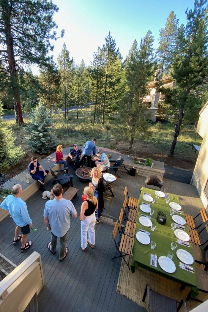 outside dinner party with people standing on deck