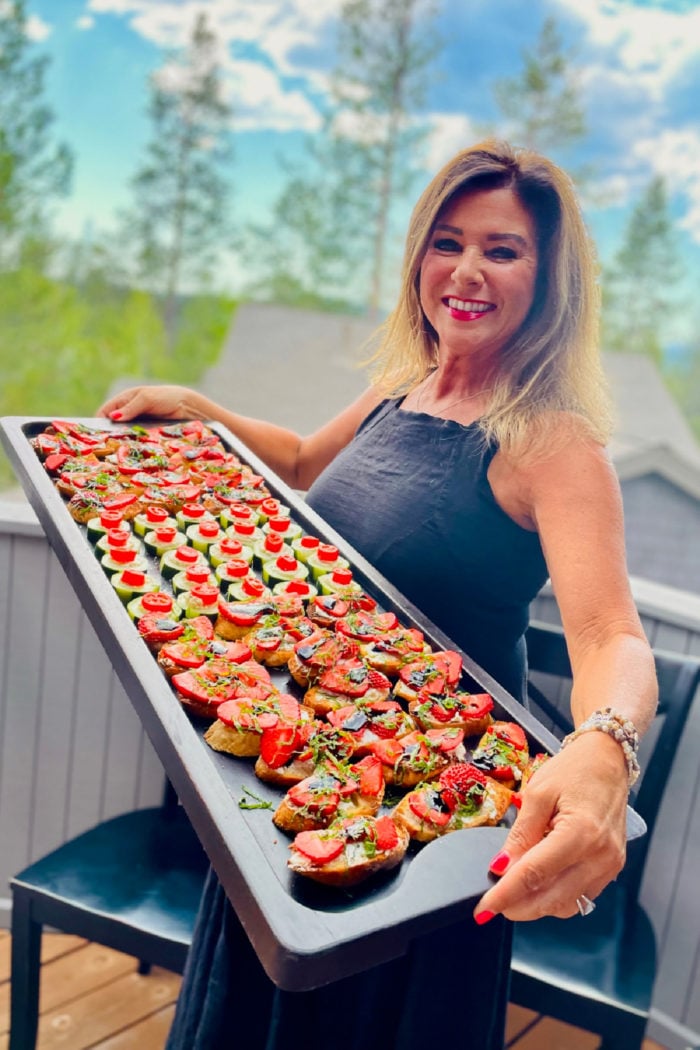 a big board of bruschetta with goats cheese