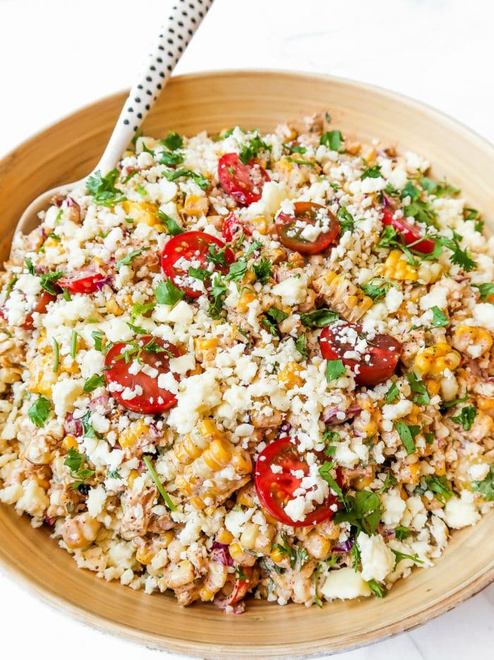 wood bowl with summer corn tomatoe salad