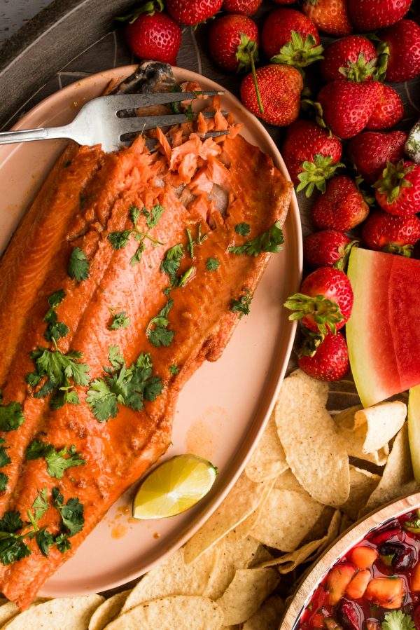 wild alaskan salmon fil cooked with garlic, lime, and garnished with cilantro