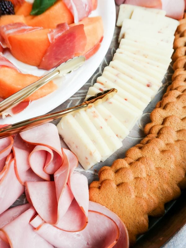 close up ham, sliced cheese, crackers