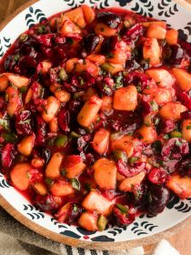 round bowl of peach and cherry salsa