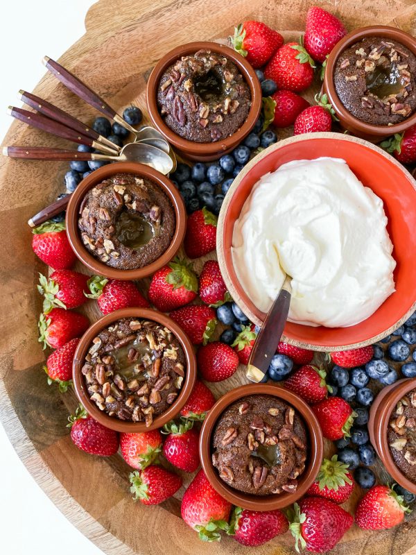 dessert board with hot lava cakes and whipped cream