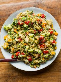 round white plate of Herbed Quinoa Veggie Salad