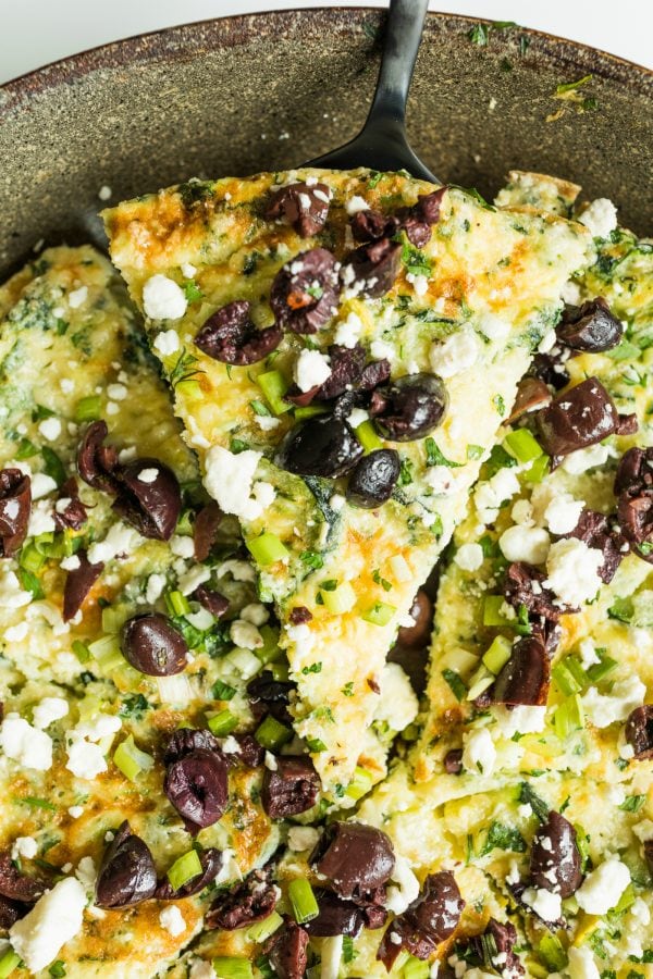 pie shaped piece of Easy Zucchini Frittata Recipe