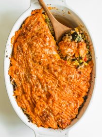 an oval dish of baked sweet potato Shepherd's pie