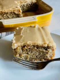 a piece of Zucchini Banana Cake with Maple Frosting