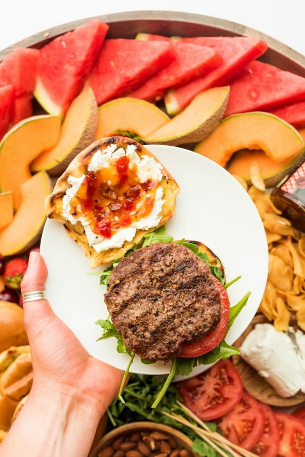 open face burger with goat cheese and arugula