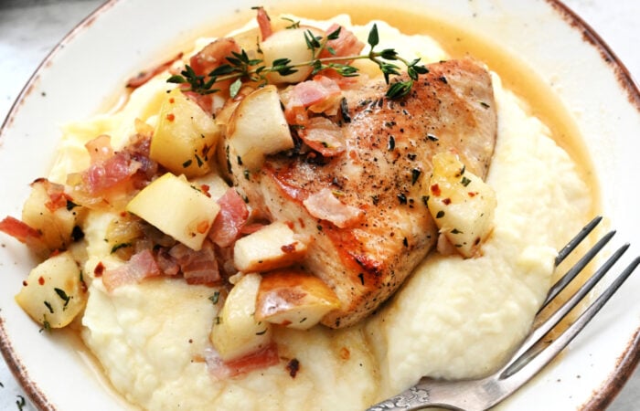 serving chicken pears on mashed potatoes