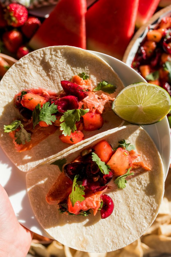 2 salmon tacos on a plate