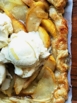 a pear tart made with puff pastry served with ice cream