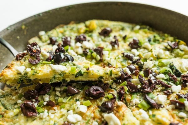 a slice of Easy Zucchini Frittata in a skillet