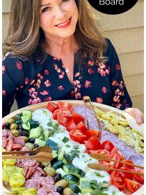 woman holding a Burrata Chopped Salad Board