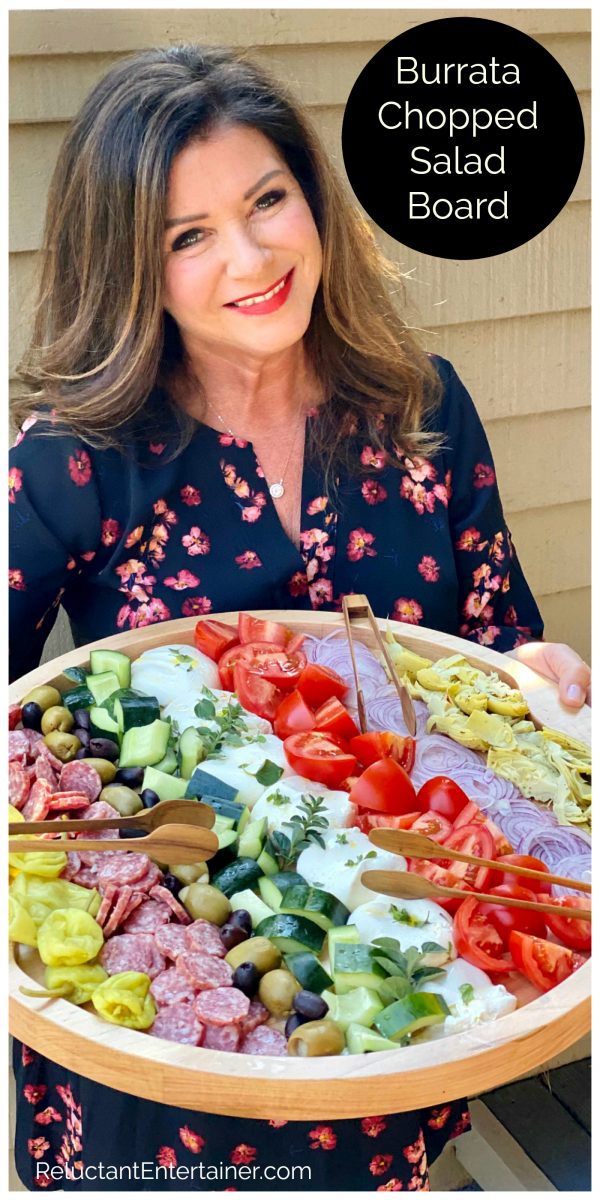 woman holding a Burrata Chopped Salad Board