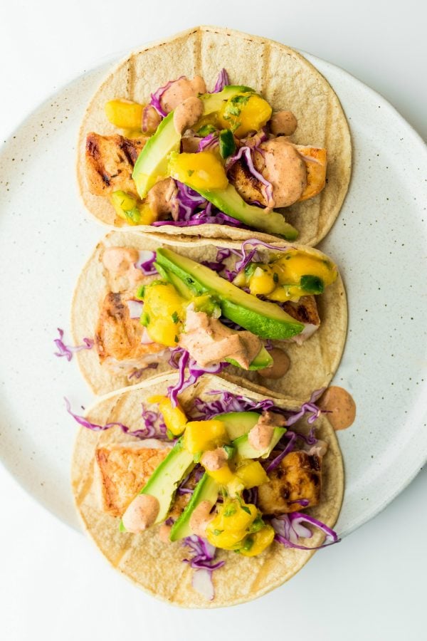 3 tacos with mahi mahi and avocados