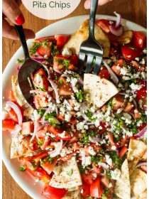 dishing up a Mediterranean Tomato Salad with Za’atar Pita Chips