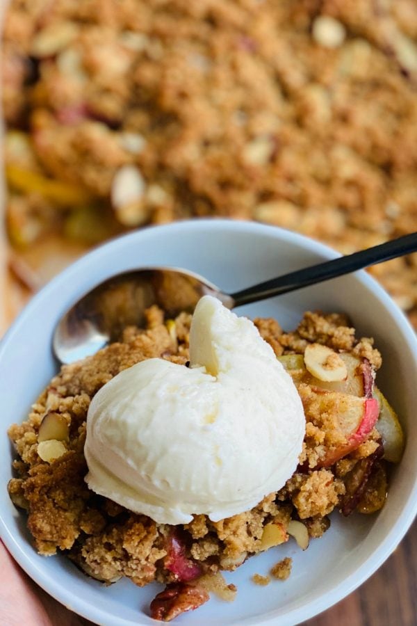 scoop of gelato on a bowl of Apple Pear Crumble Without Oats