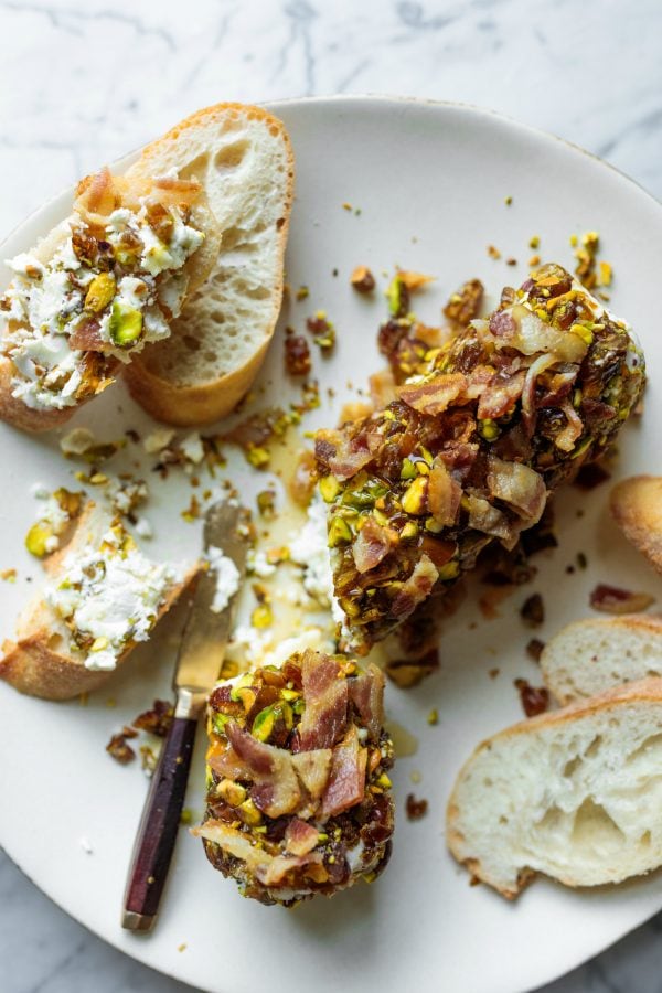 serving a Pistachio Bacon Date Cheese Log