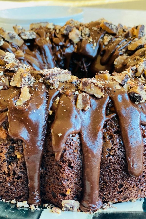 close up frosting on a Toffee Crunch Chocolate Bundt Cake