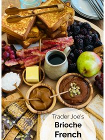 breakfast tray with french toast, bacon, and fruit