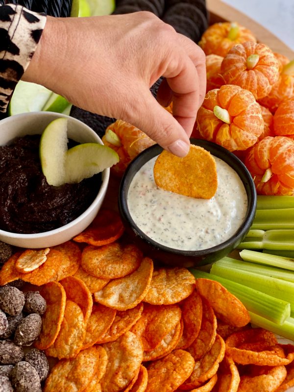 dipping a popchip into ranch dressing