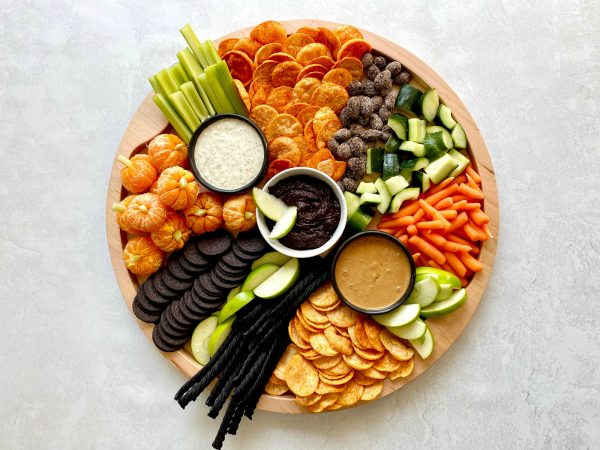 round halloween board with popchips and snacks