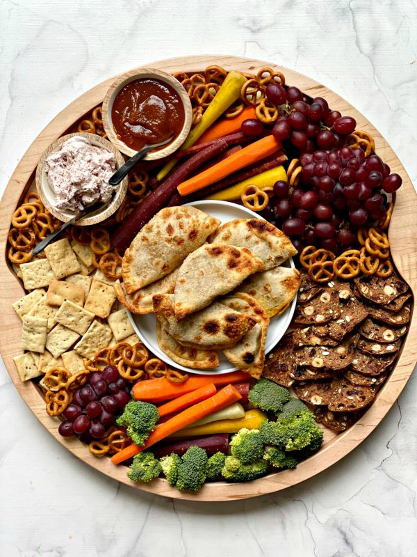 round wood Pumpkin Empanada Snack Board