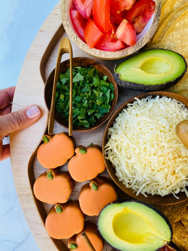 holding the undercut handle on a big board, with taco ingredients