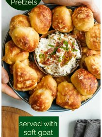 round wood plate of biscuit pretzel bites