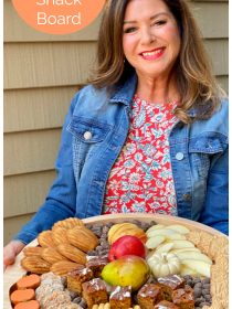 woman holding a fall snack tray