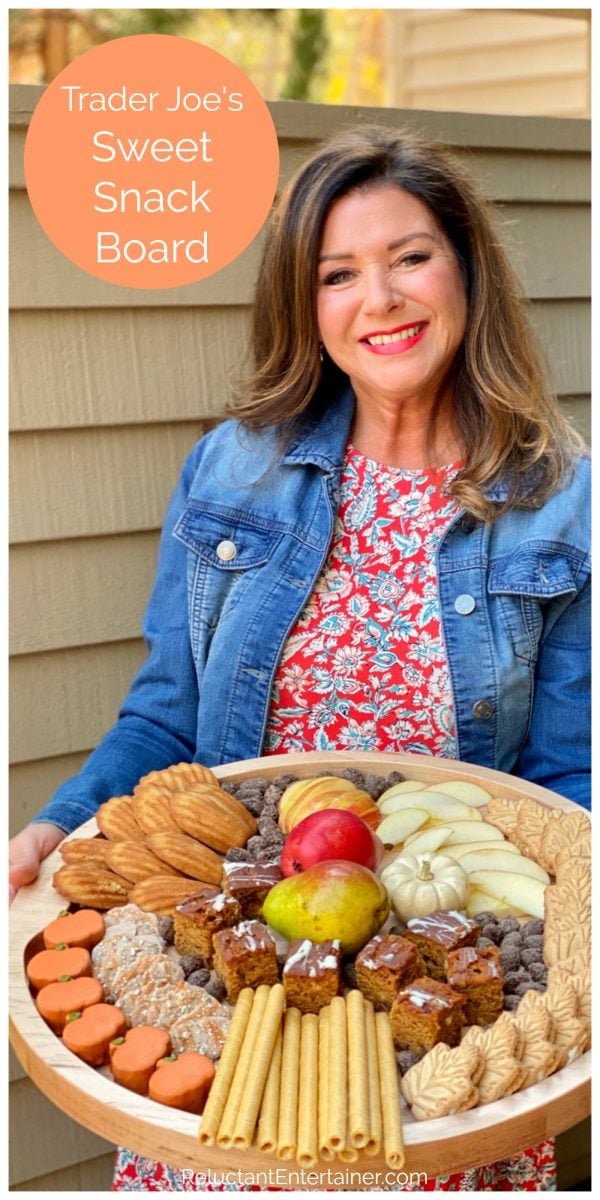 woman holding a fall snack tray