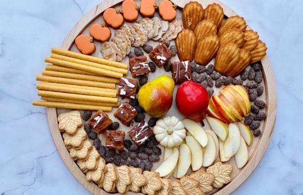 beautiful round dessert board with sweet snacks