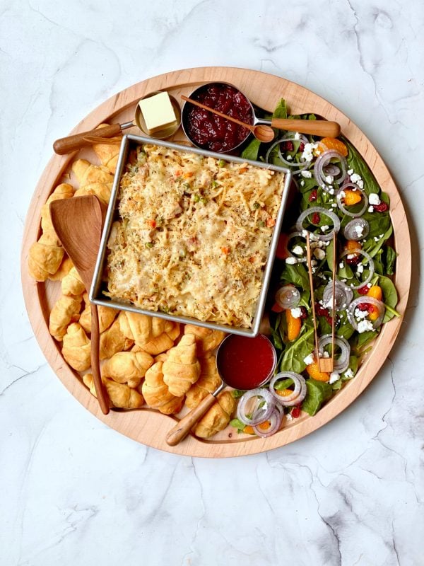 round dinner board with turkey tetrazzini