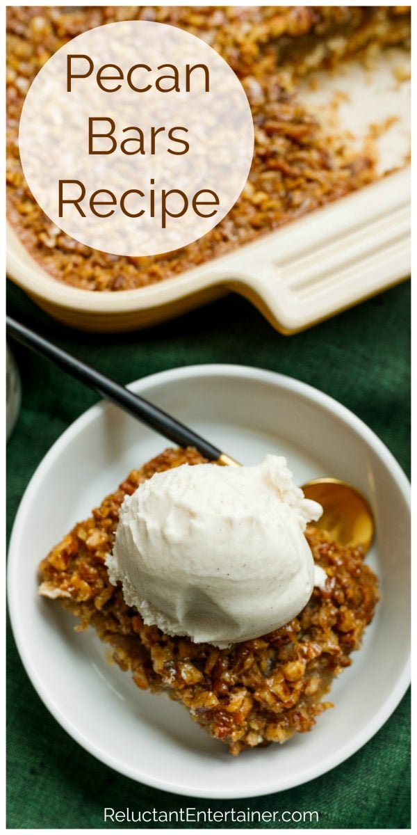 square serving of pecan bars with vanilla ice cream