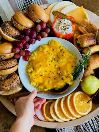 bagel board with scrambled eggs