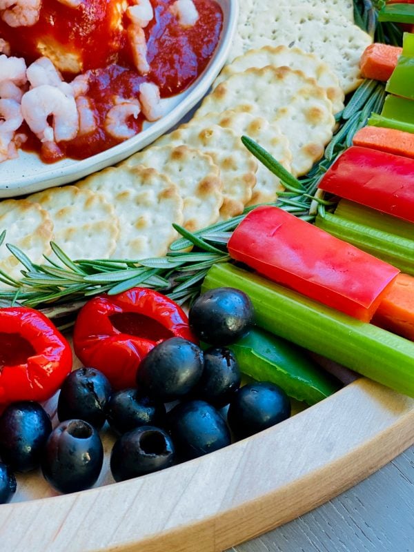 veggies and olives on a Holiday Shrimp Cocktail Crudités