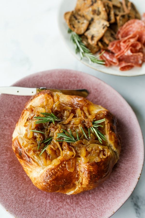 Onion Brie En Croute on a serving plate